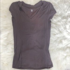 Brown t-shirt. Very casual and cute.